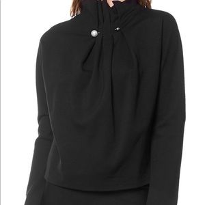 Chic and Classic Black Top with Pearl Pin